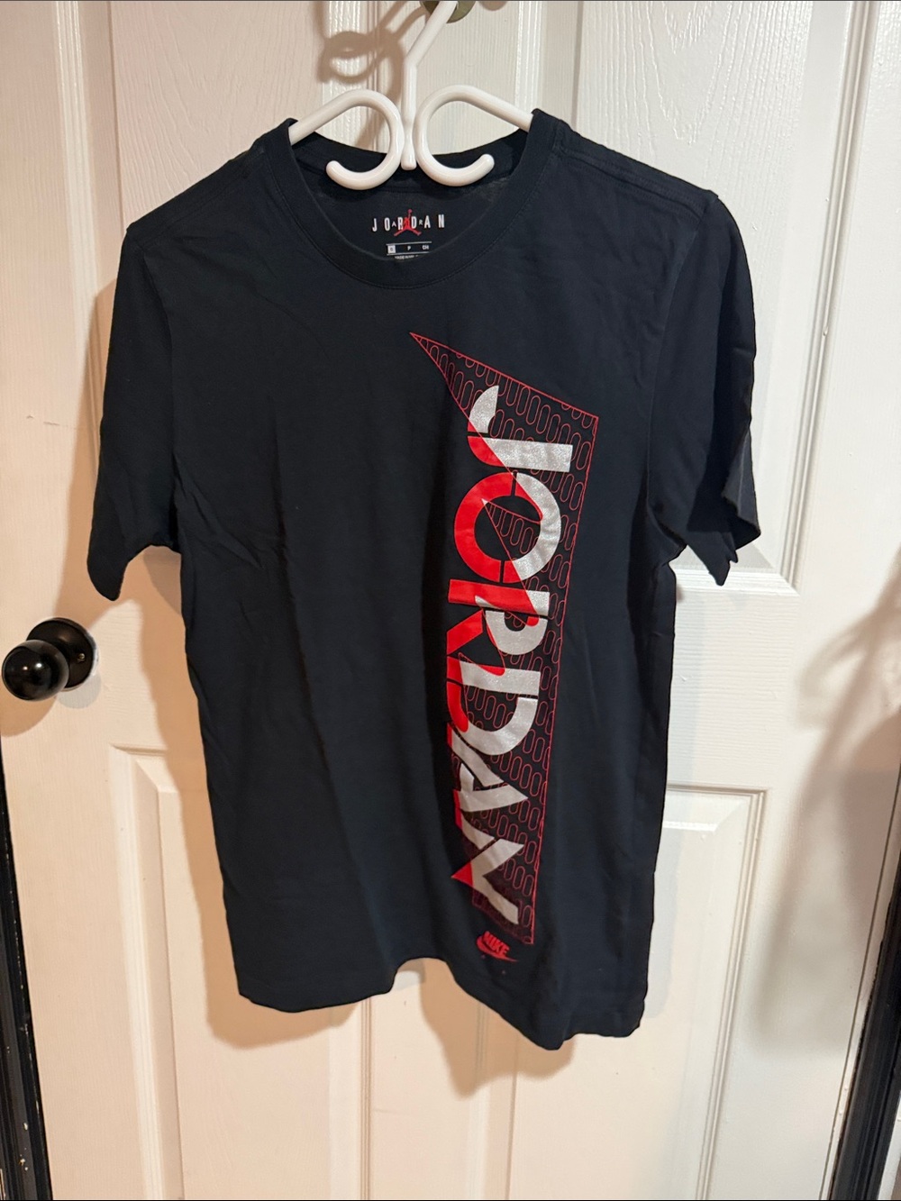 Jordan Black Short Sleeve Tee with Red and White Vertical Logo